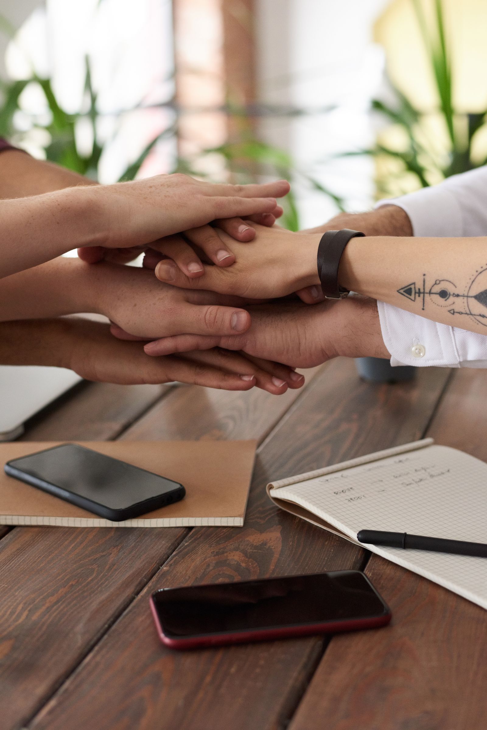 A diverse group collaborating around a table