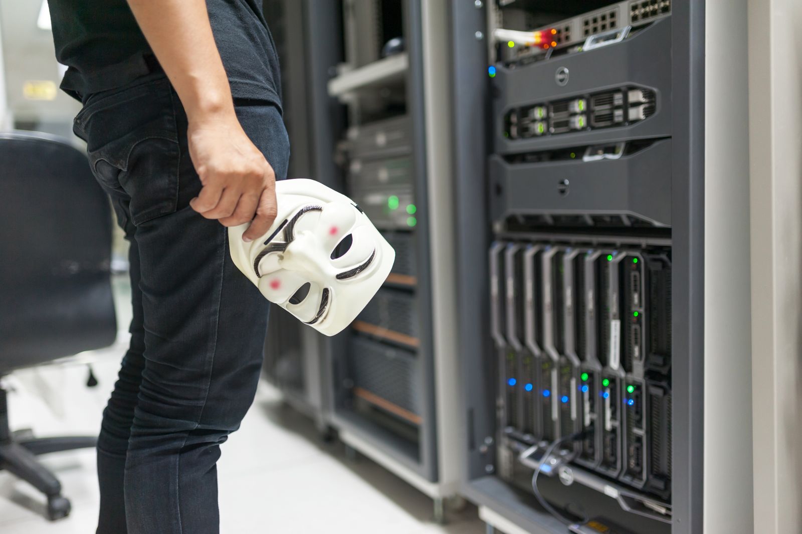 A person in a data center illustrating identity theft risk